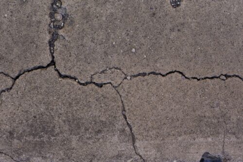 What causes cracking to a home's slab?